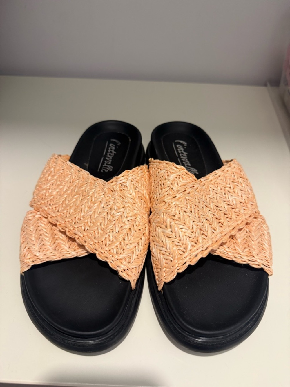 Woven peach colored slides